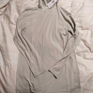 Universal Standard jersey turtleneck in grey